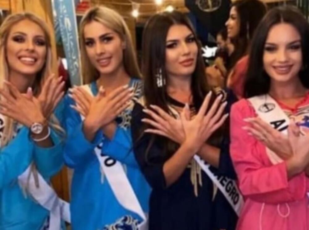 Српската мисица Валентина Петровиќ која покажа двоглав орел исклучена од изборот за мис, се враќа дома (ФОТО)